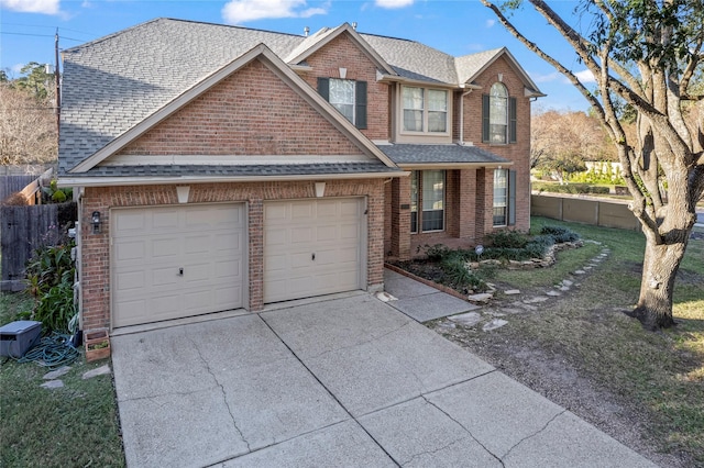 view of front of property featuring a garage