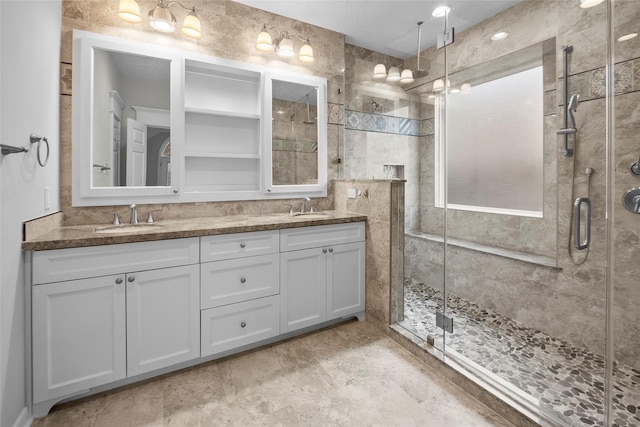 bathroom with vanity and an enclosed shower