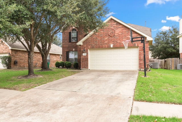 view of property featuring central AC unit and a front yard