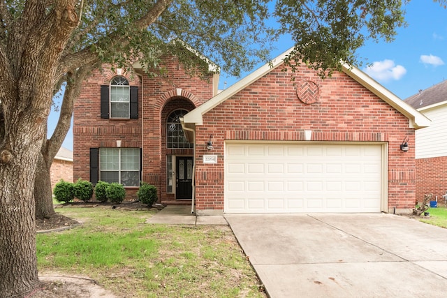 front of property with a garage