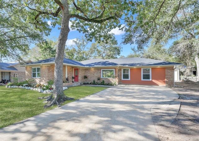 ranch-style house with a front lawn