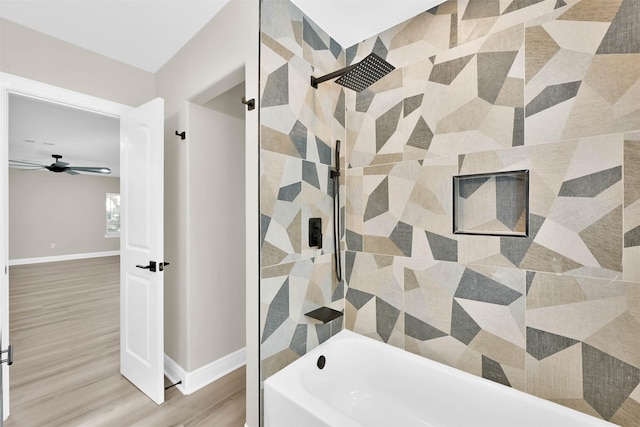 bathroom featuring shower / tub combination and hardwood / wood-style flooring