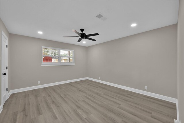 unfurnished room with light hardwood / wood-style floors and ceiling fan