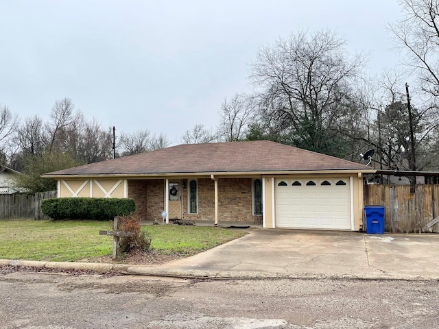 ranch-style home featuring a garage and a front lawn