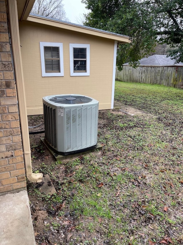 view of yard with central air condition unit