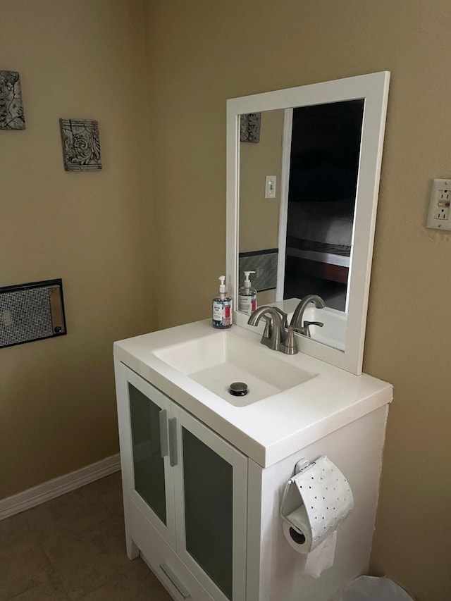 bathroom with vanity and tile patterned floors