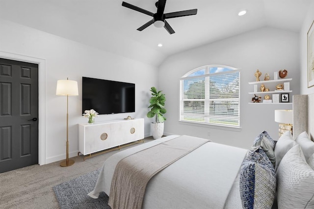 bedroom with carpet floors, ceiling fan, and lofted ceiling