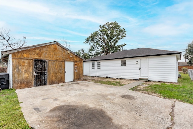 back of property featuring a patio