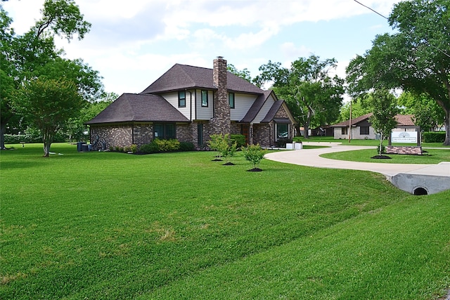 exterior space featuring a front lawn