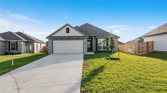 ranch-style home with a front lawn and a garage