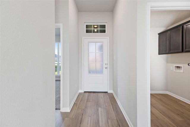 doorway to outside featuring light hardwood / wood-style flooring