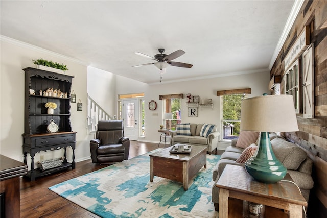 living room featuring french doors, dark hardwood / wood-style flooring, ornamental molding, and ceiling fan