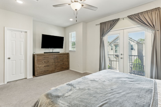 carpeted bedroom featuring access to outside, ceiling fan, and french doors