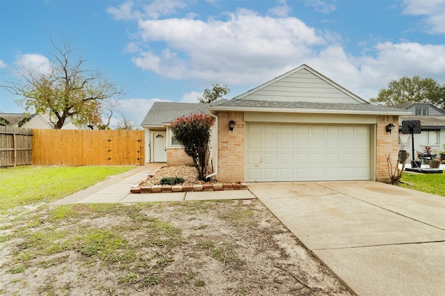 view of front facade featuring a garage and a front yard