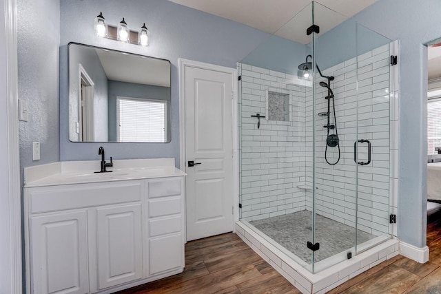 bathroom with vanity and walk in shower