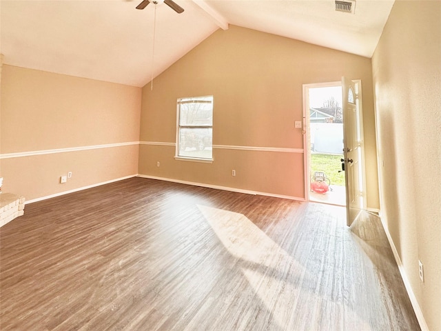 spare room with lofted ceiling with beams, hardwood / wood-style flooring, and ceiling fan