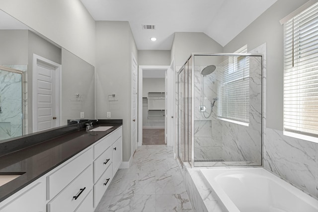 bathroom with vanity, a wealth of natural light, plus walk in shower, and lofted ceiling