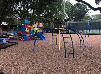 view of home's community featuring a playground