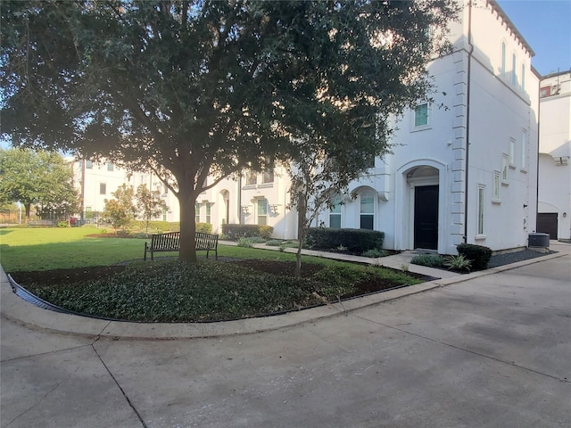 exterior space with a front yard