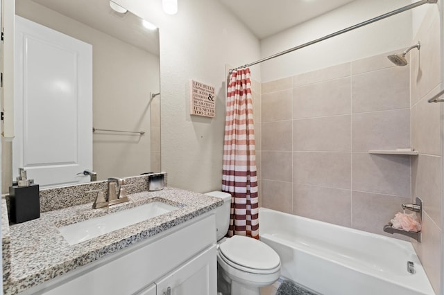 full bathroom with shower / tub combo with curtain, vanity, and toilet