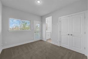 unfurnished bedroom featuring a closet