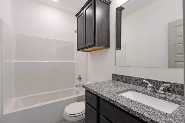 full bathroom with shower / washtub combination, vanity, and toilet