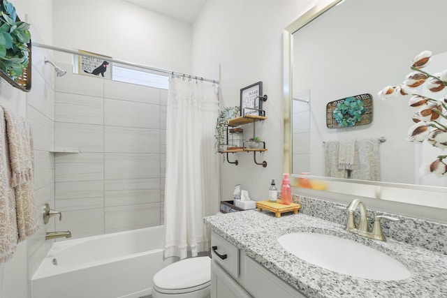 full bathroom featuring vanity, toilet, and shower / bathtub combination with curtain