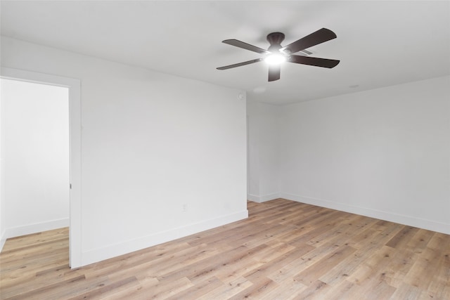 unfurnished room with light hardwood / wood-style flooring and ceiling fan