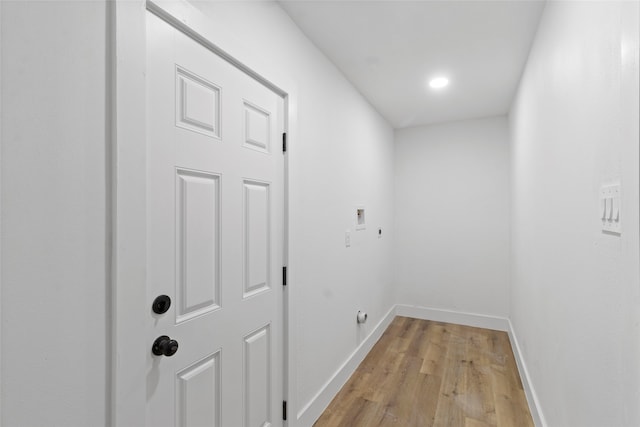 corridor featuring light hardwood / wood-style floors