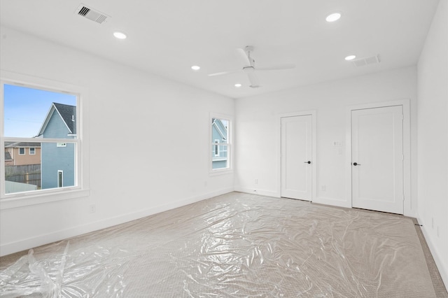 empty room with ceiling fan