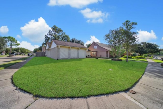 view of property exterior with a yard