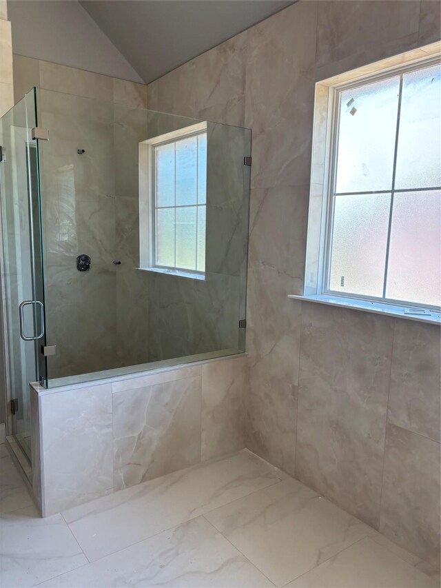 2419 Ryan St, Brenham, TX 77833 - full bath with a shower stall and vaulted ceiling