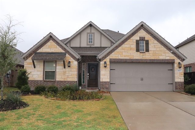 view of front facade with a garage and a front yard