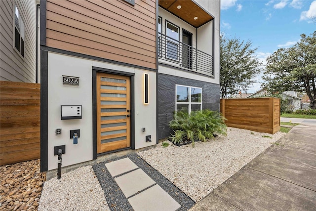 property entrance with a balcony