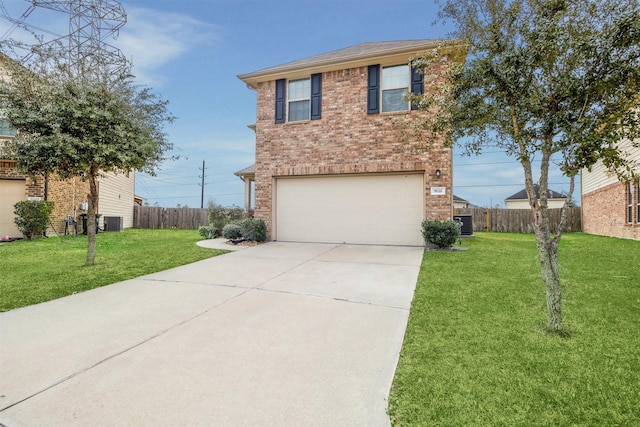 view of front of property featuring cooling unit, a garage, and a front yard