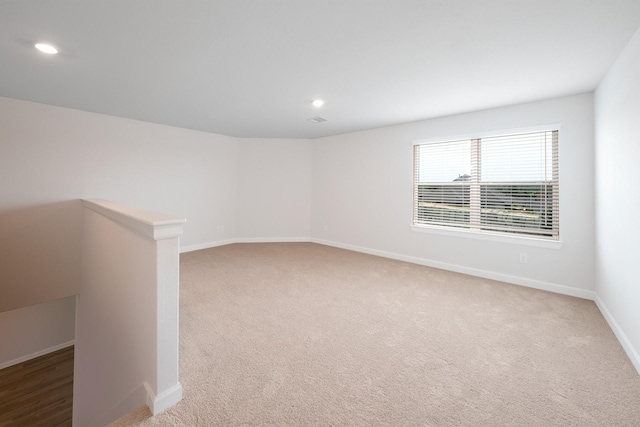 empty room featuring carpet flooring