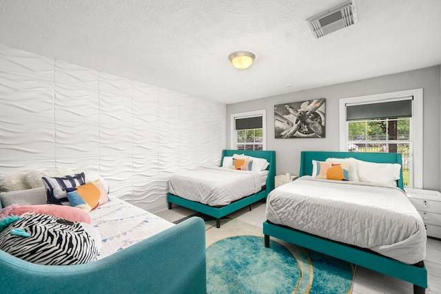 bedroom featuring a textured ceiling