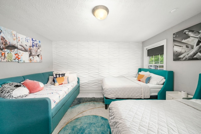 bedroom featuring a textured ceiling