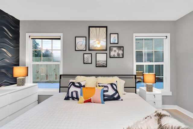 bedroom featuring hardwood / wood-style floors