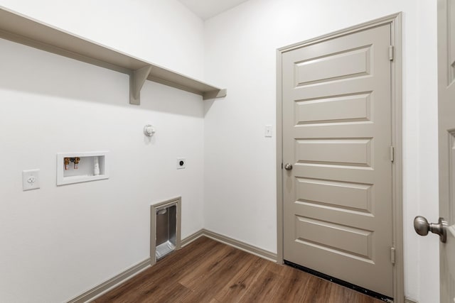 washroom with gas dryer hookup, dark hardwood / wood-style flooring, electric dryer hookup, and hookup for a washing machine