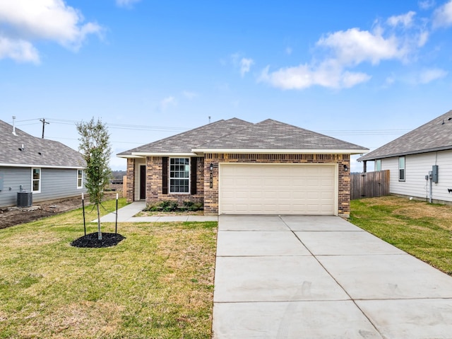 ranch-style house with a front yard and a garage