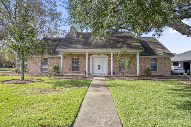 view of front of home with a front lawn