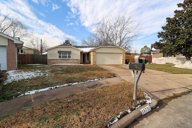 ranch-style house with a garage and a front lawn