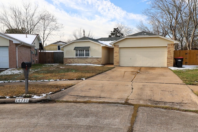 ranch-style home with a garage