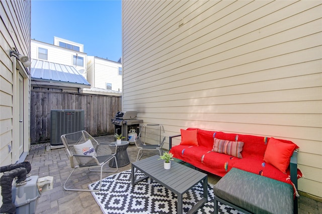 view of patio featuring an outdoor hangout area, central AC, and a grill