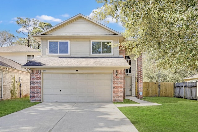 front of property with a garage and a front lawn