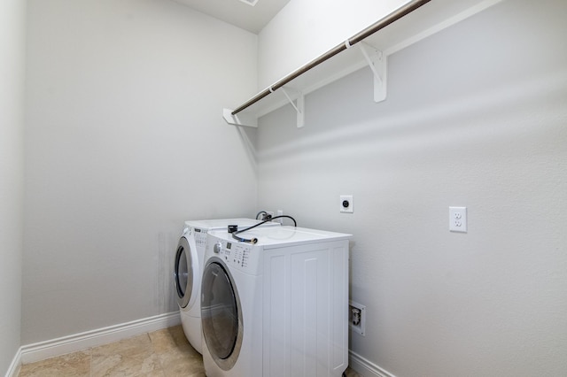 laundry area featuring independent washer and dryer