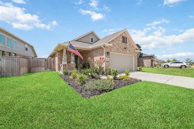 view of front facade featuring a garage and a front lawn