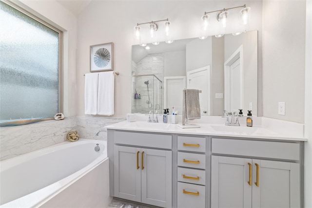 bathroom with shower with separate bathtub and vanity