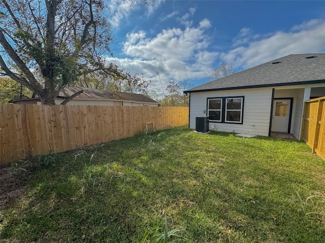 view of yard featuring central AC